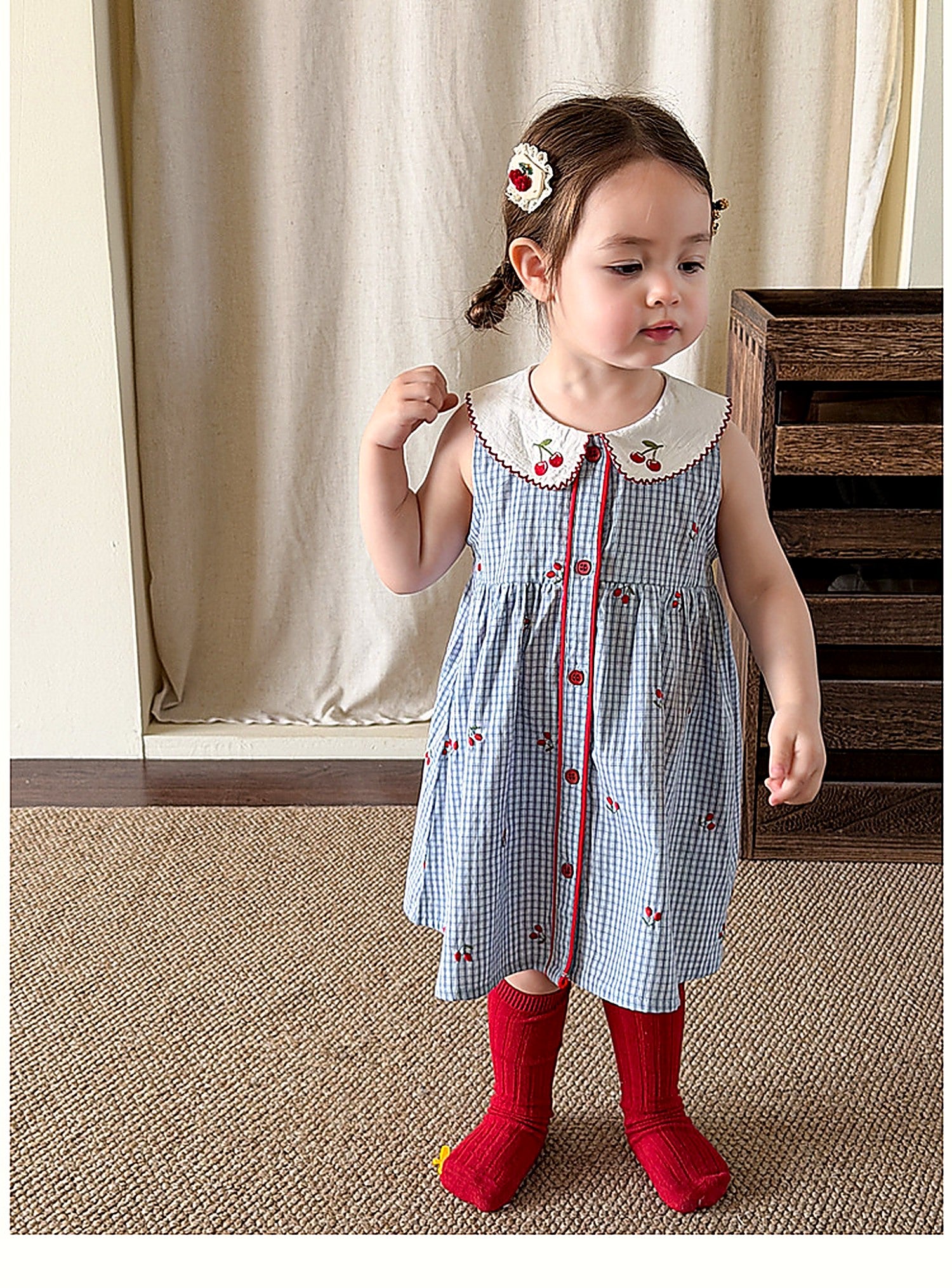The button front of the Bluebell Pinafore.