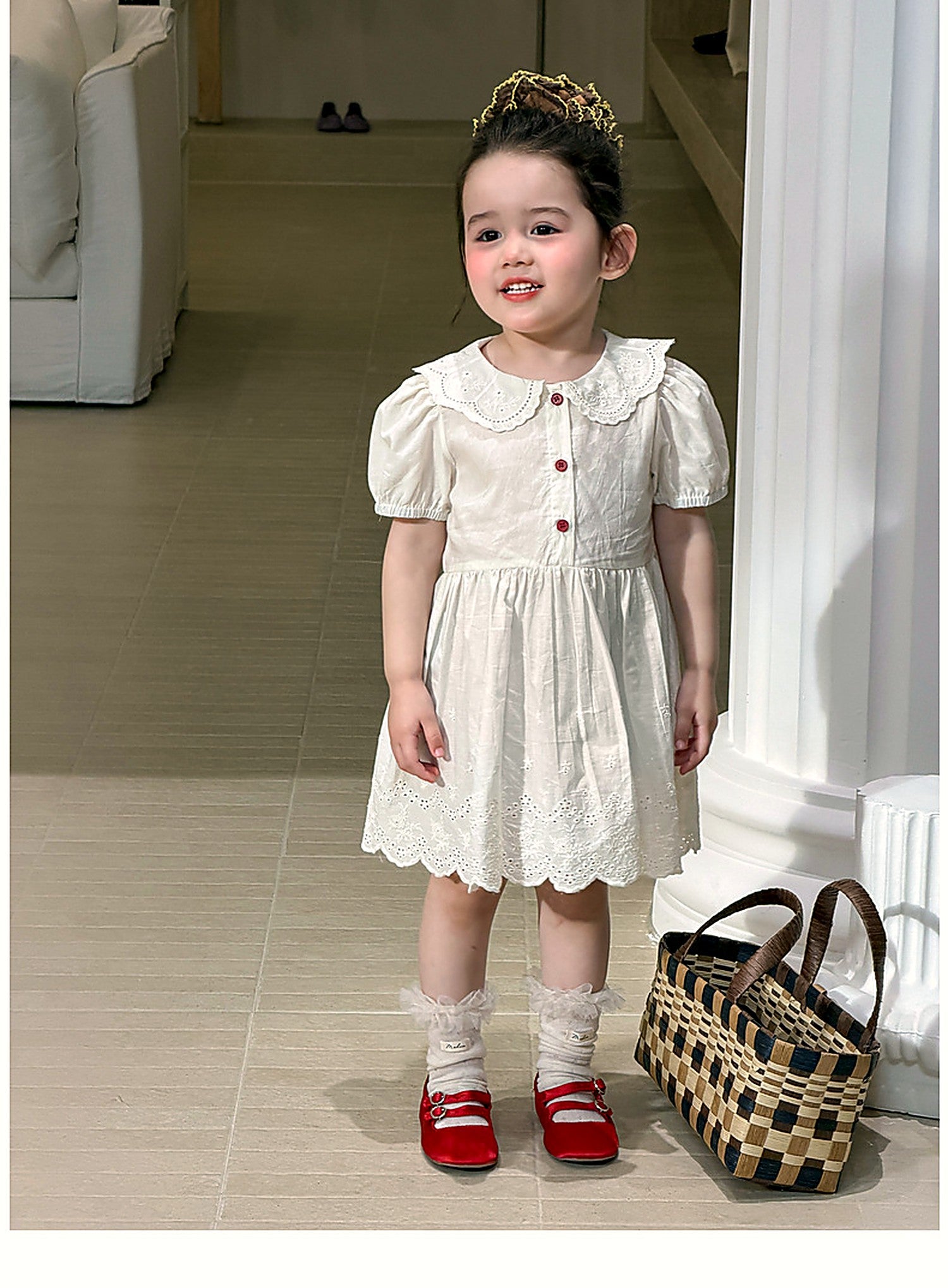 The lace and eyelet skirt of the Daisy Dress.