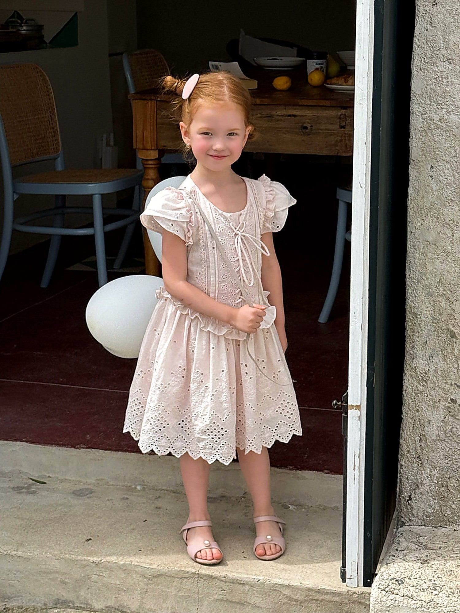 The blush-pink Mallow Dress in washed cotton.