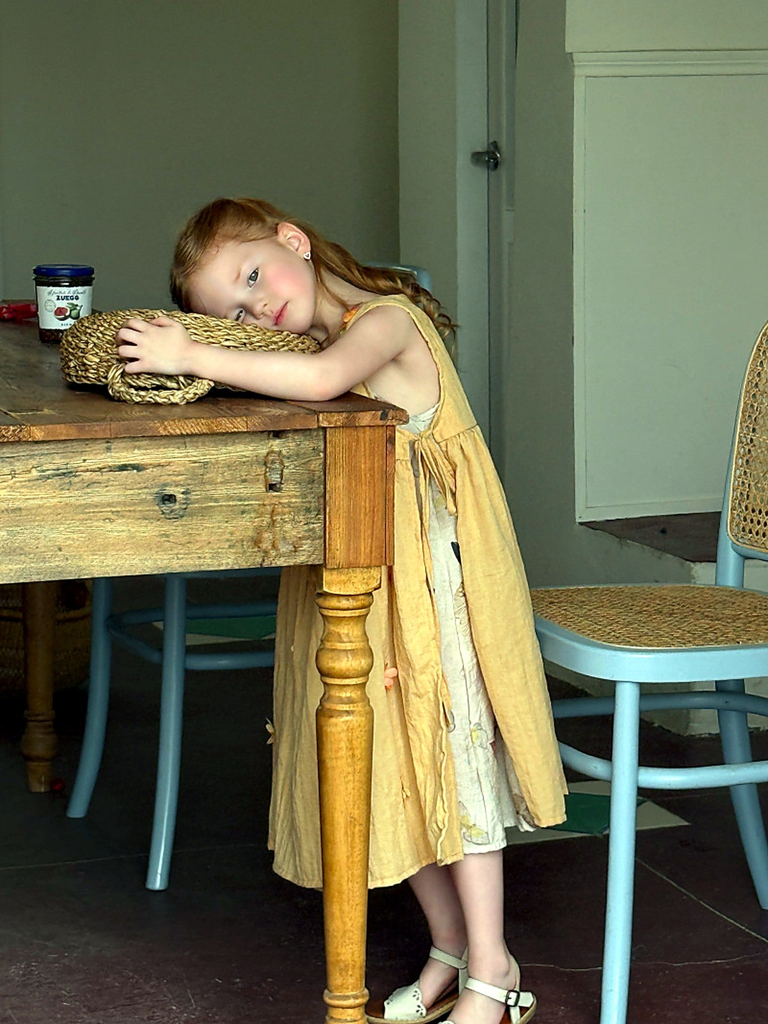 The open, cross-strap back of the Marigold Dress.