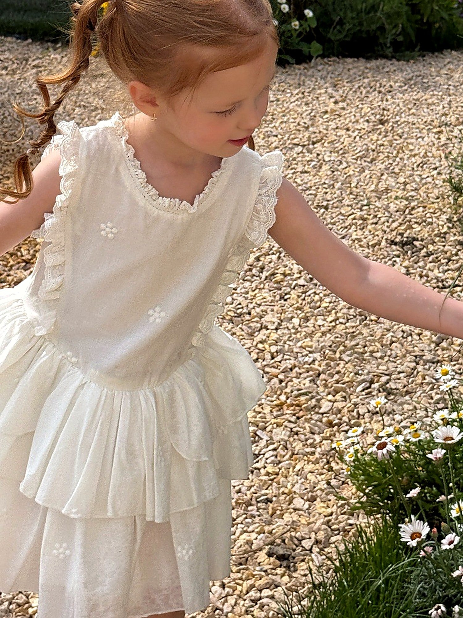 The tiered ruffled back of the Snowdrop Dress.